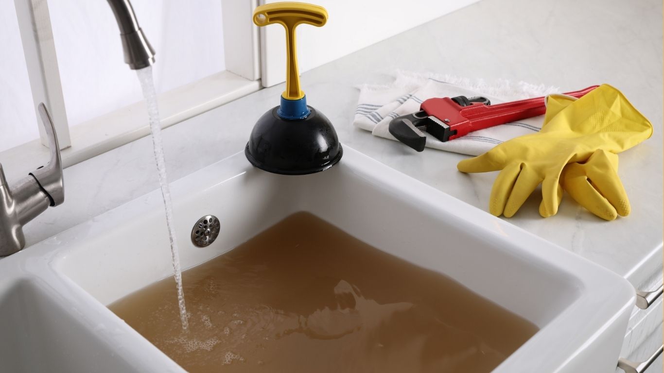Bồn Rửa Bát Bị Trào Nước: Nguyên Nhân Và Cách Xử Lý